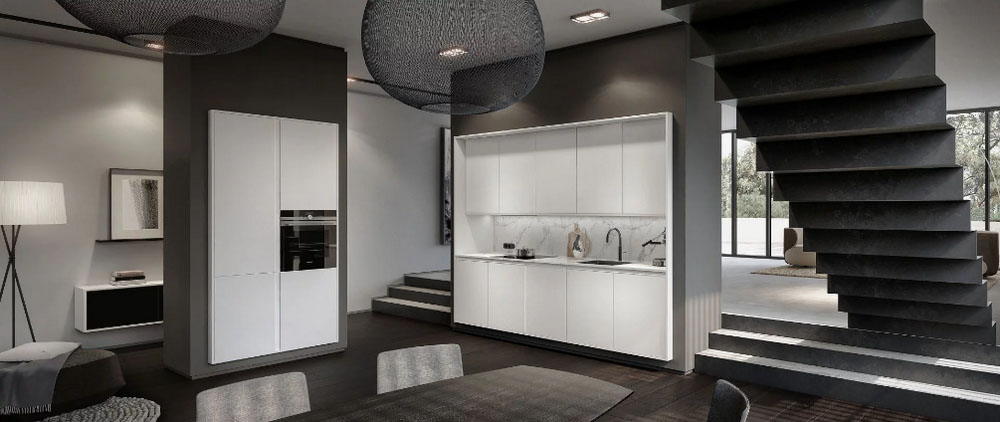 Een titanium witte SieMatic Pure keuken met in totaal tien keukenkastjes in het keukenblok. De hoge keukenkast bevat een ingebouwde oven en vier keukenkasten.